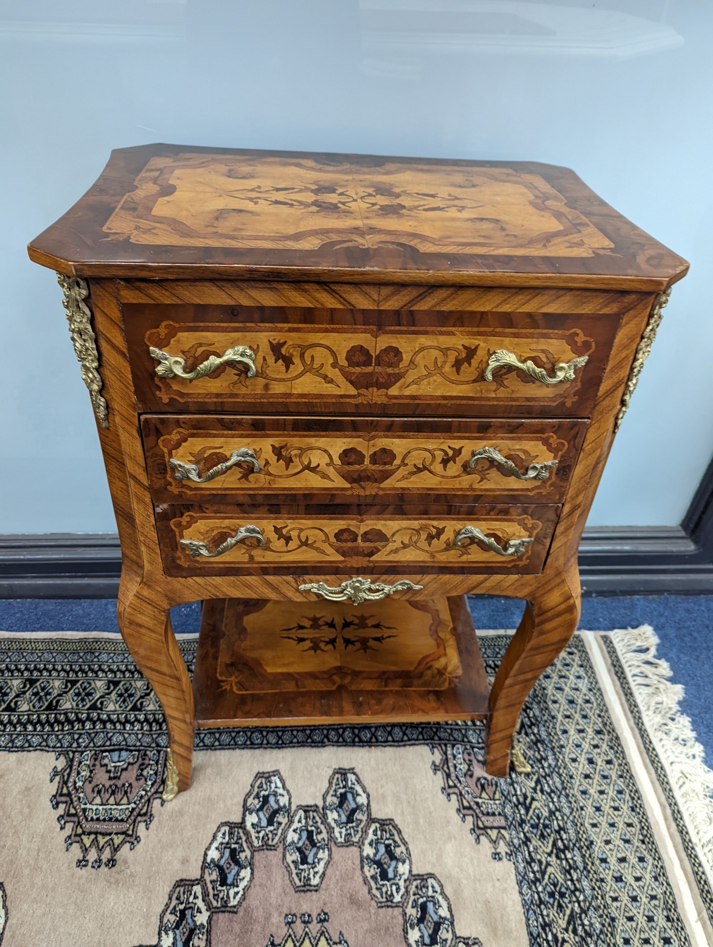A pair of Louis XVI style marquetry bedside chests, each fitted with a two side drawers above two front long drawers, width 53cm, height 75cm